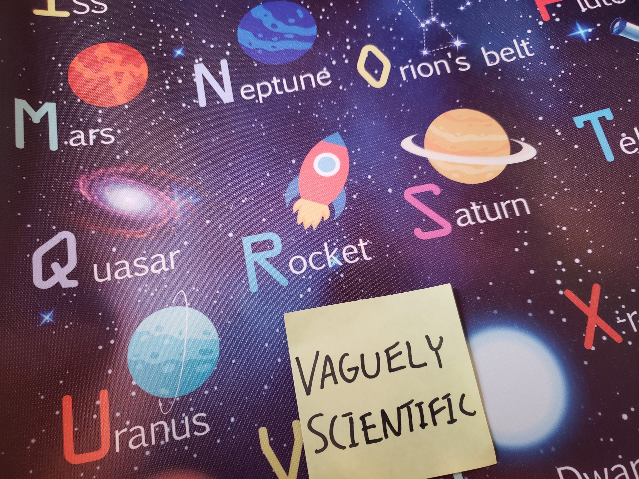 A space-themed alphabet, with V being for Vaguely Scientific.